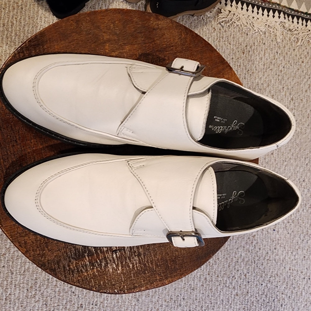 Off white leather buckle loafers